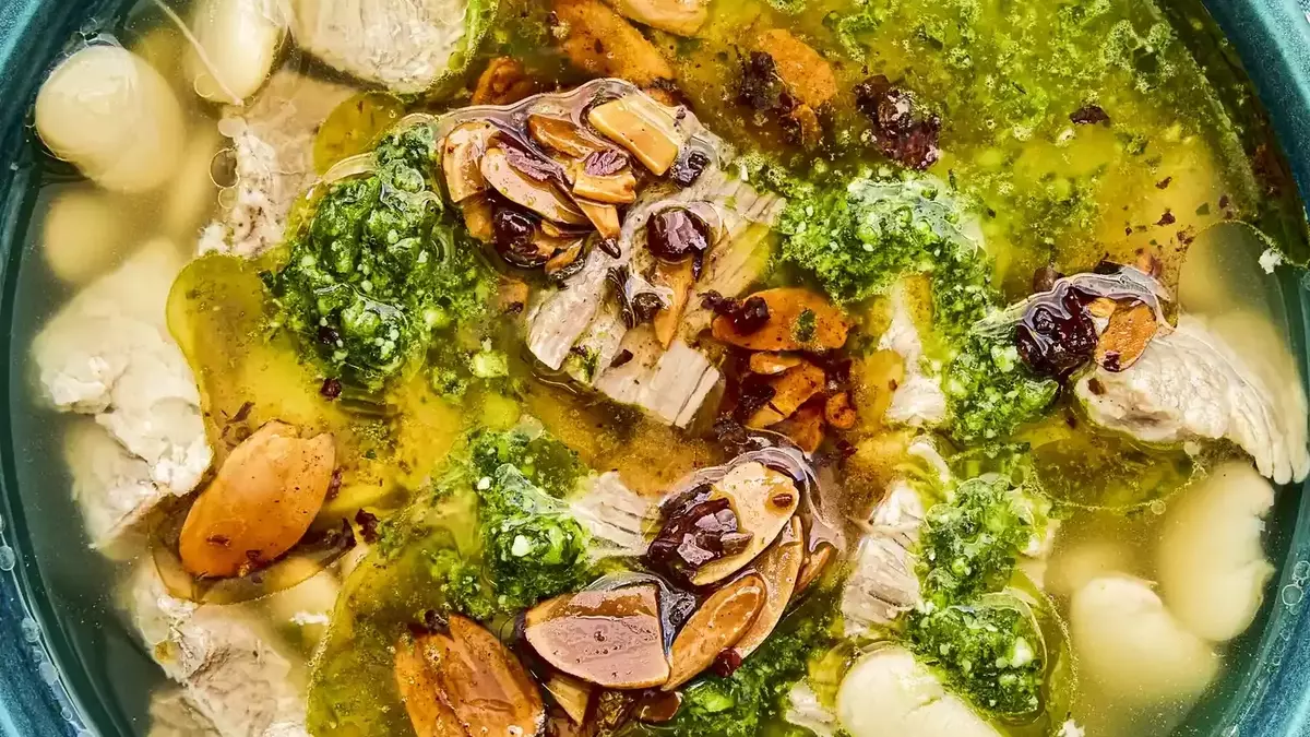 Mexican Brothy Beans with Pork, Salsa Macha, and Cilantro Pesto