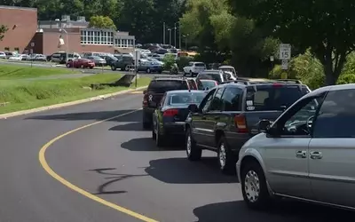 The Perplexing Phenomenon of Protracted School Pick-Up Queues