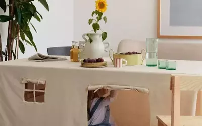 Crafting Whimsical Worlds: The DIY Tablecloth Playhouse