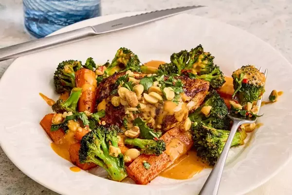 Sheet-Pan Thai Red Curry Chicken with Peanut-Lime Sauce: A Flavorful Weeknight Meal