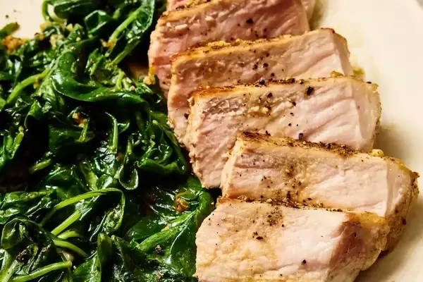 Quick One-Pan Garlic-Butter Pork Chops with Sautéed Spinach