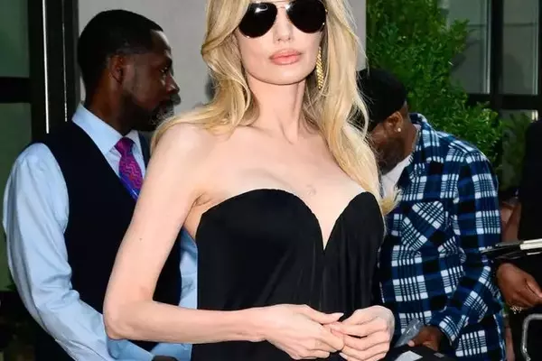 Angelina Jolie Shines in Black Gown at 'Couture' Screening